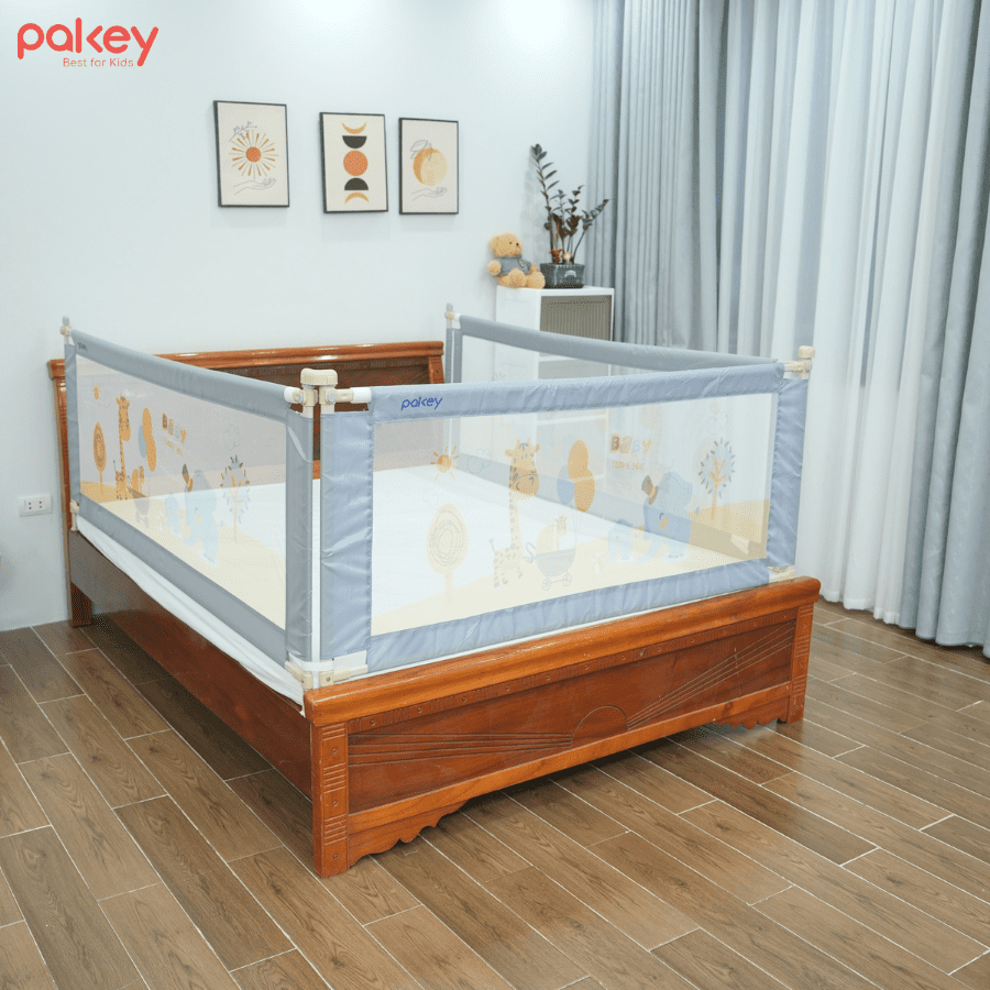 Lắp thanh chắn giường vào giường rồi cố định mũ chụp liên kết các thanh