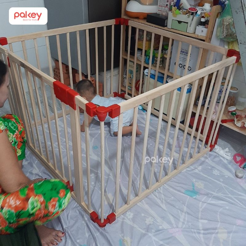 Quây cũi gỗ cho bé