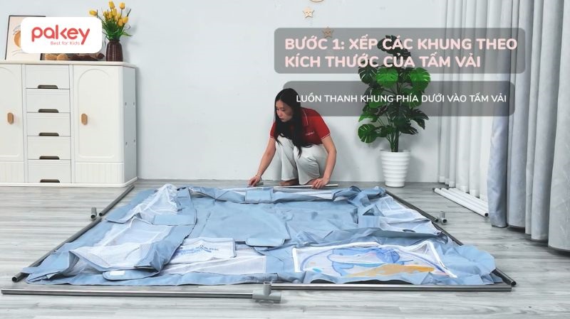 Tiến hành lồng các khung thép vào mặt dưới của tấm vải